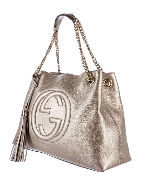 white gucci purse with gold chain|Gucci purse shoulder strap.